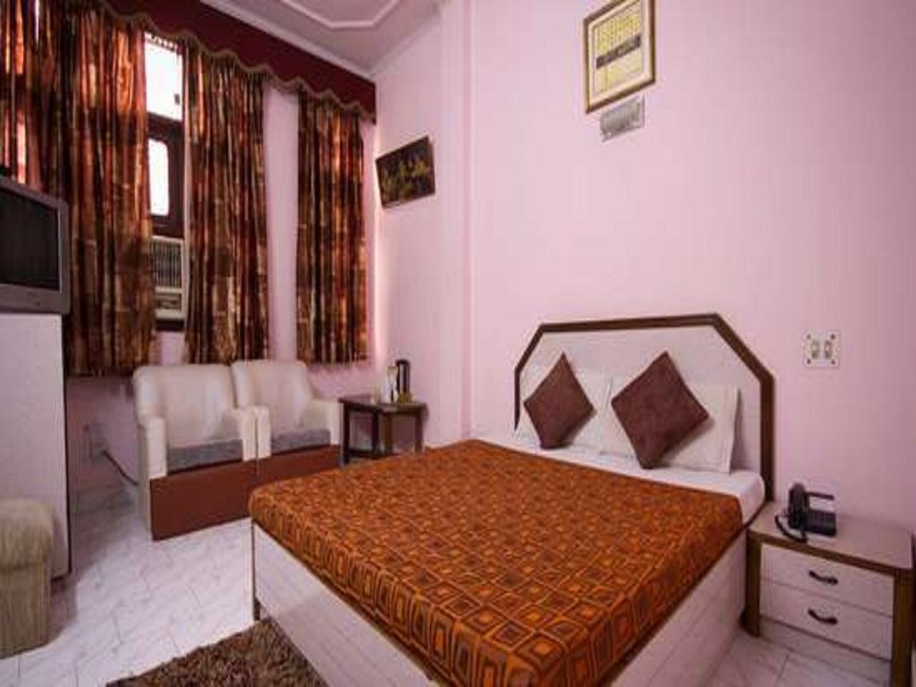 Hotel Woodland Deluxe Új-Delhi Szoba fotó