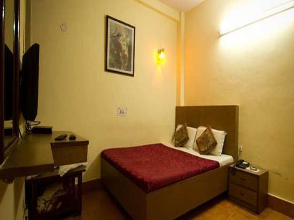 Hotel Woodland Deluxe Új-Delhi Szoba fotó